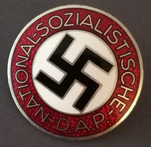 The DAP (Deutsche Arbeiterpartei) is officially renamed NSDAP (Nationalsozialistische Deutsche Arbeiterpartei) - Example of a NSDAP member badge